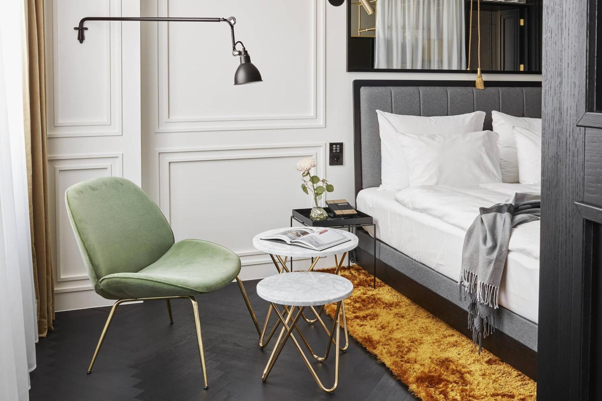 Roomers Munich, Autograph Collection Bagian luar foto A room at the hotel