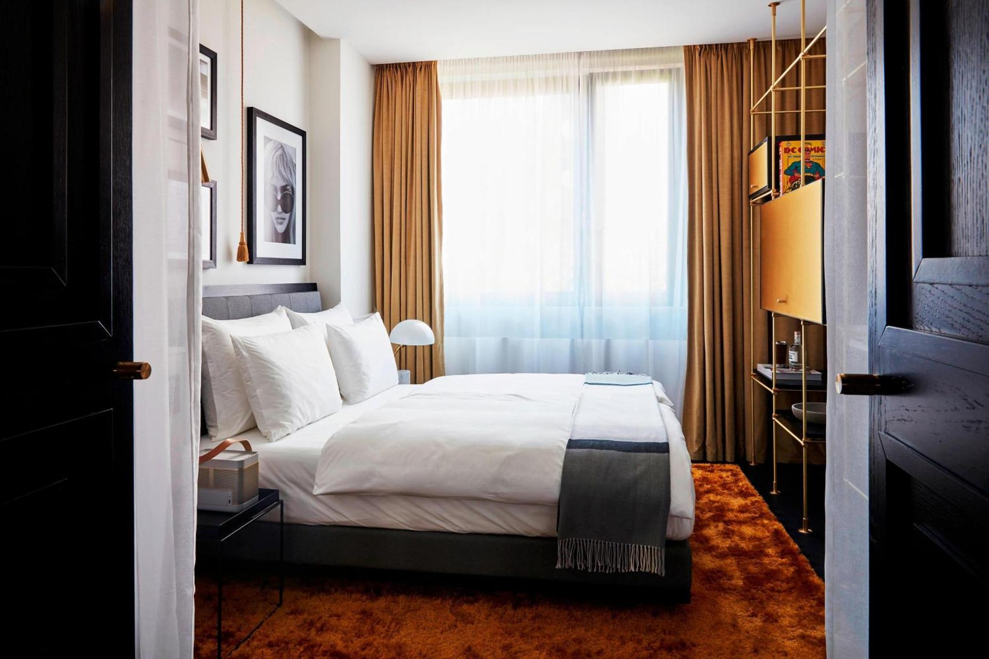 Roomers Munich, Autograph Collection Bagian luar foto A room at the Hotel 57